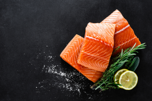Salmon with herbs and lime that is cut into peices